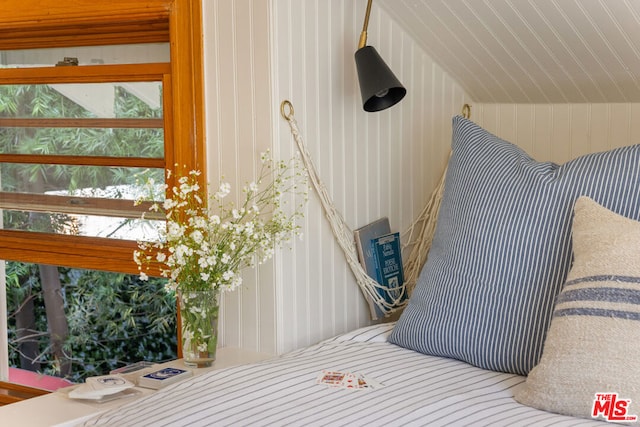 bedroom with vaulted ceiling