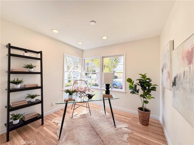 home office with light wood-type flooring