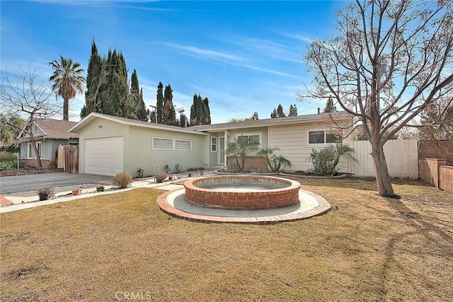 ranch-style home with a garage and a front lawn