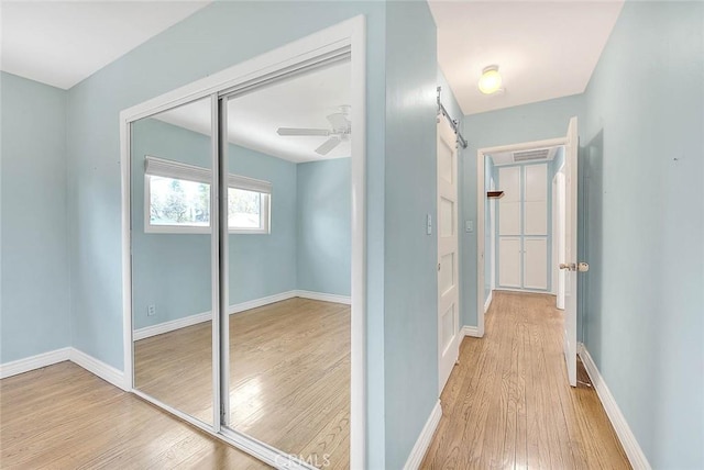 hall featuring light hardwood / wood-style flooring