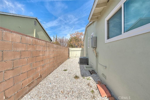 view of side of property featuring cooling unit