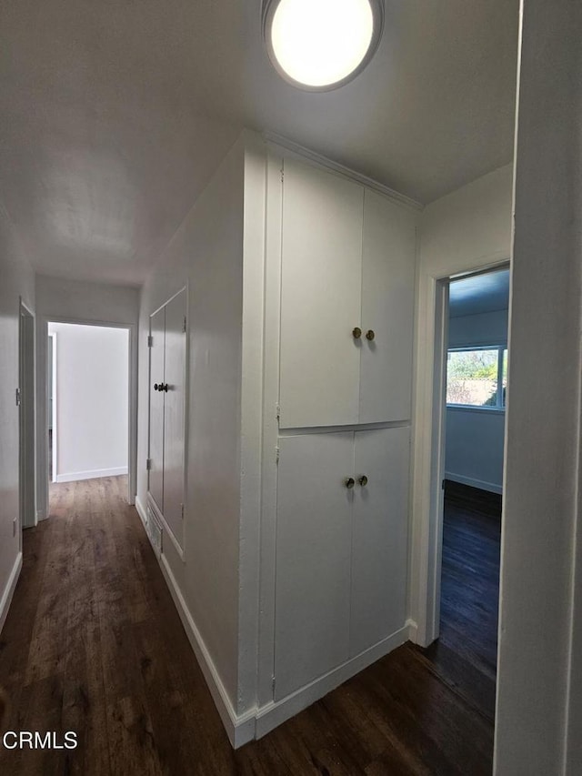 hall featuring dark hardwood / wood-style flooring