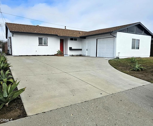 single story home featuring a garage