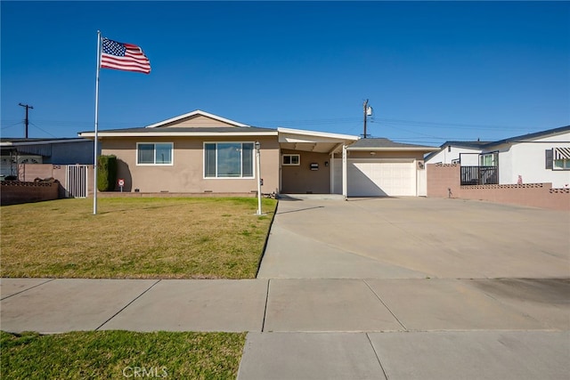 ranch-style house with a garage and a front lawn