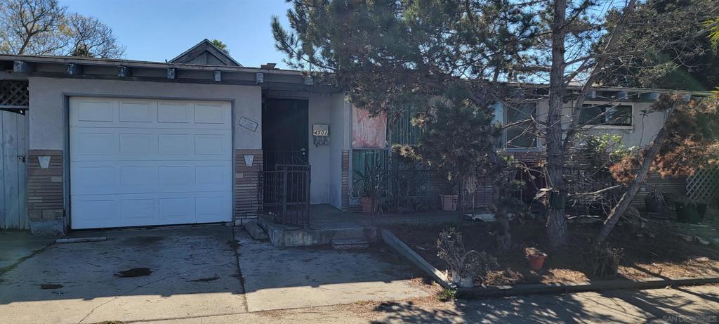 view of front of house with a garage