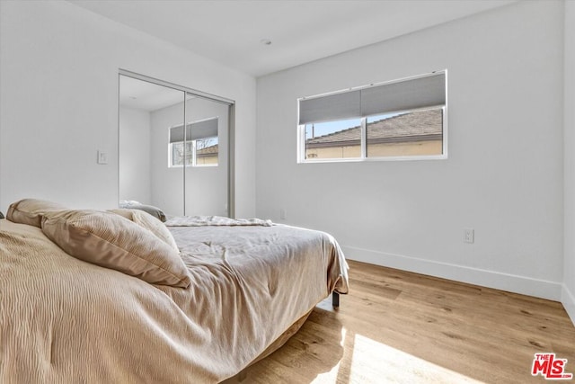 bedroom featuring hardwood / wood-style flooring