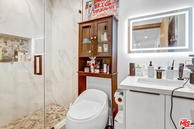 bathroom with walk in shower, vanity, and toilet