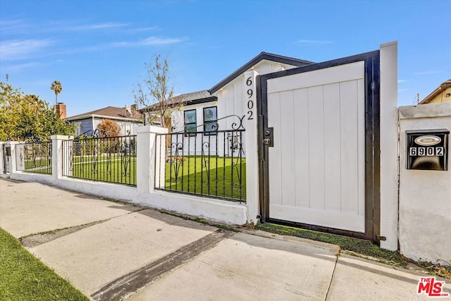 exterior space featuring a front lawn