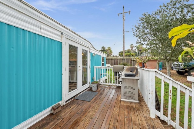 wooden terrace featuring french doors