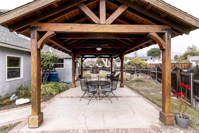 view of patio / terrace with a gazebo and ceiling fan