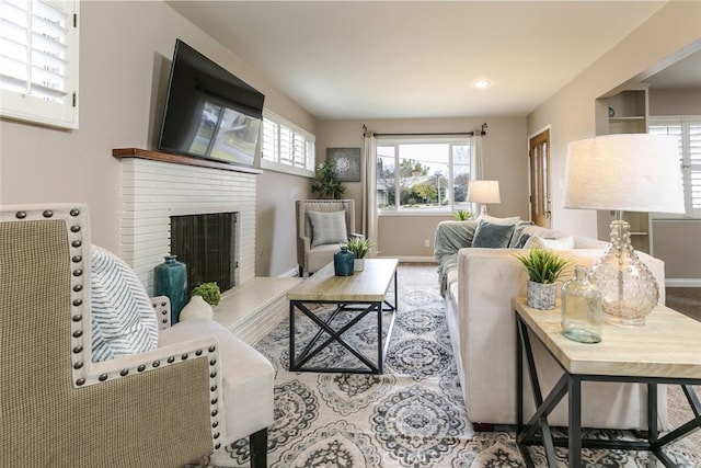 living room featuring a fireplace