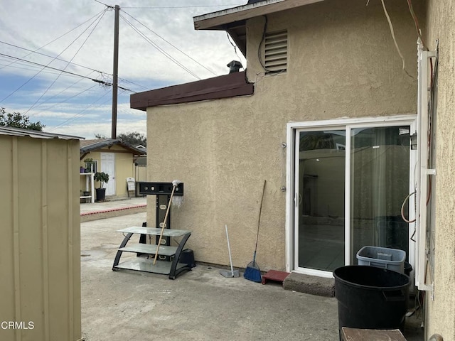 exterior space with a patio