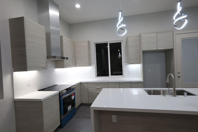 kitchen with sink, wall chimney range hood, stainless steel range with electric stovetop, and decorative light fixtures