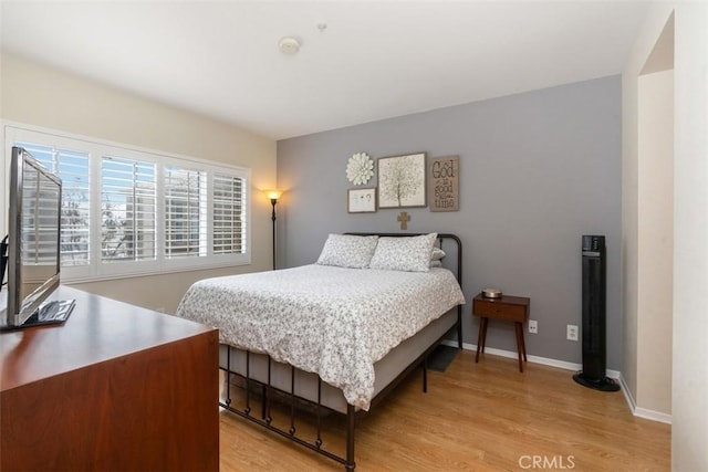 bedroom featuring light wood-type flooring