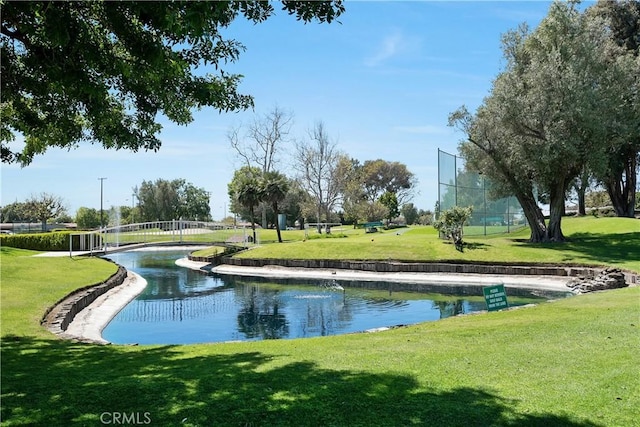 surrounding community featuring a lawn