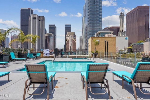 view of pool featuring a patio area