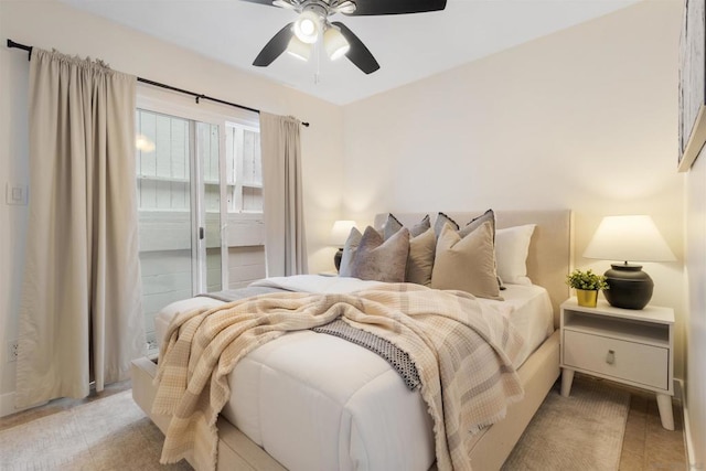 bedroom with access to exterior and ceiling fan