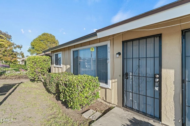 property entrance with board and batten siding