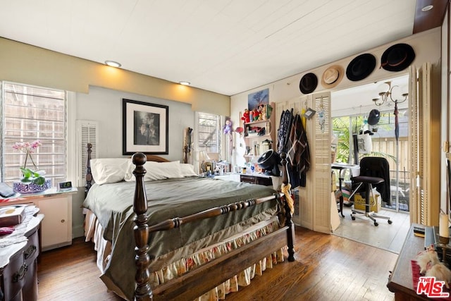 bedroom featuring wood-type flooring