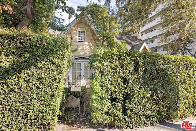 view of home's exterior with french doors