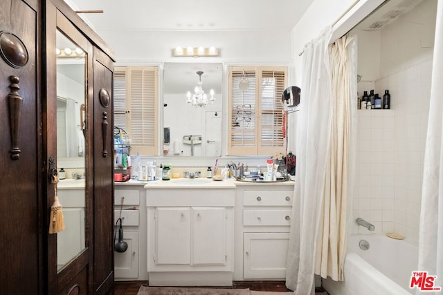 bathroom with vanity and shower / bathtub combination with curtain