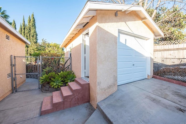 view of side of property featuring a garage