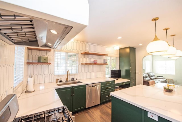 kitchen featuring green cabinets, dishwasher, sink, and light stone countertops