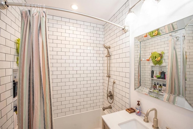 bathroom with vanity and shower / bath combo