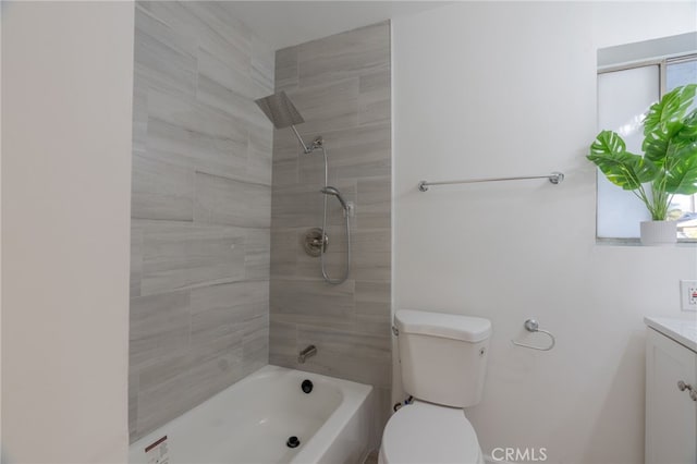 bathroom featuring shower / bath combination, vanity, and toilet