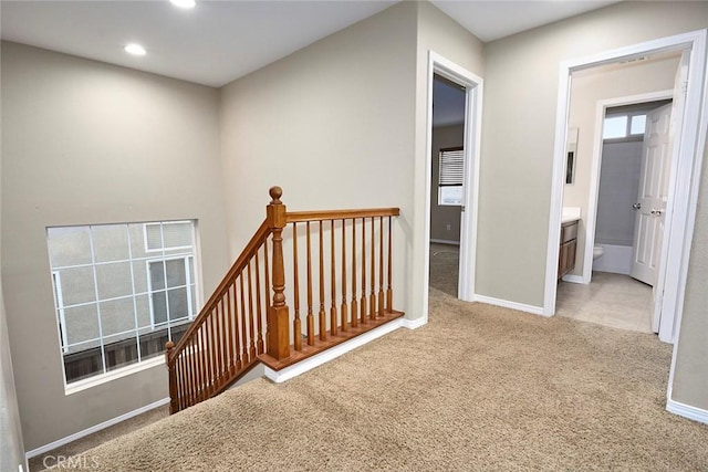 corridor with carpet floors