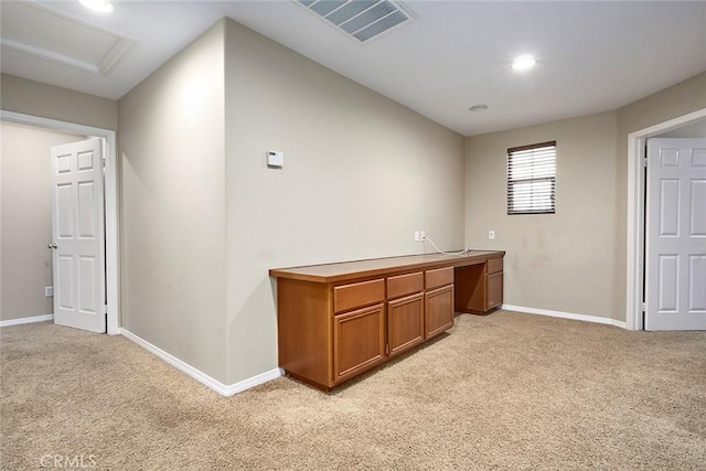 interior space featuring light colored carpet