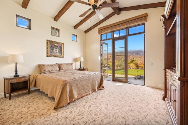 bedroom with beam ceiling, high vaulted ceiling, a mountain view, access to outside, and light colored carpet