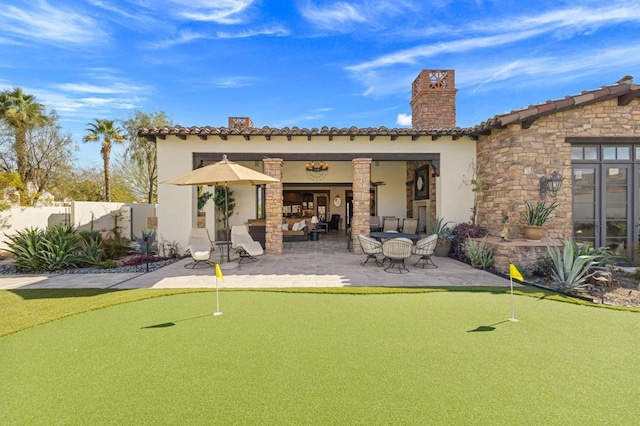 rear view of property with a patio