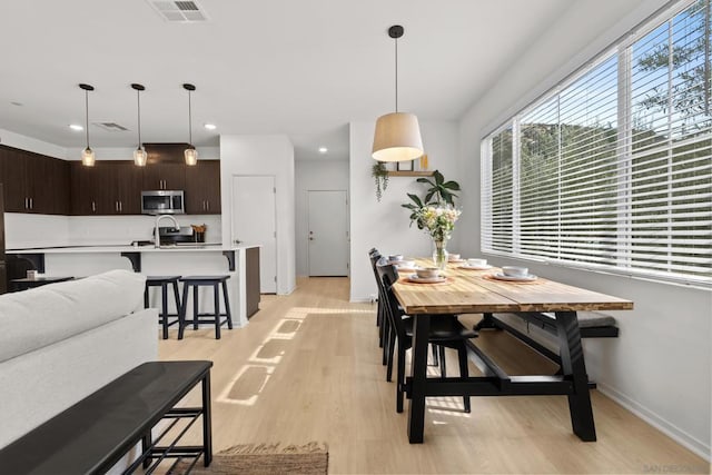 dining area featuring light hardwood / wood-style floors