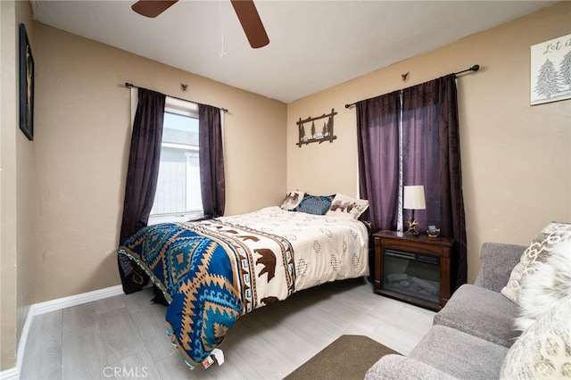 bedroom featuring ceiling fan