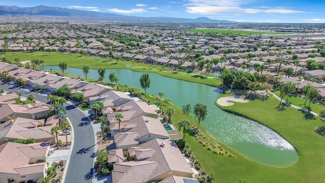 bird's eye view featuring a water and mountain view