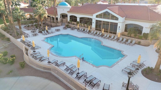 view of swimming pool with a patio area