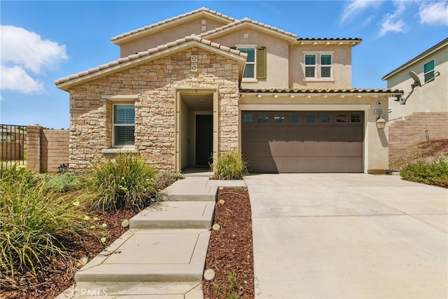24583 Acadia Dr, Corona, CA 92883 - view of front of property with stone siding, driveway, a tile roof, an attached garage, and stucco siding