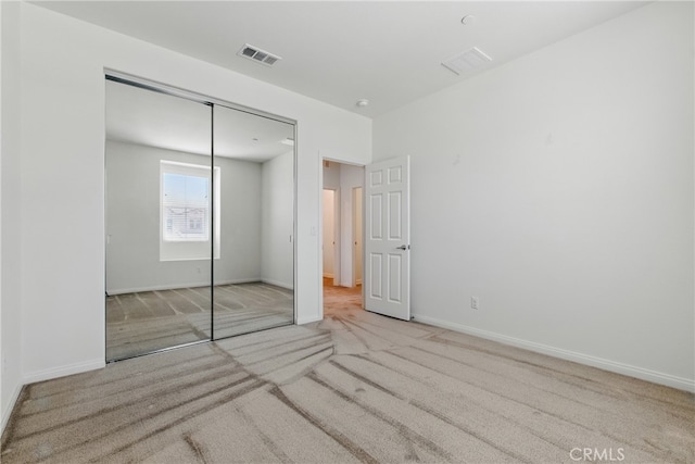 24583 Acadia Dr, Corona, CA 92883 - unfurnished bedroom featuring carpet floors and a closet