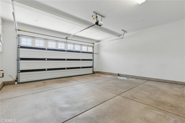 24583 Acadia Dr, Corona, CA 92883 - garage featuring a garage door opener and baseboards