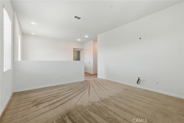 24583 Acadia Dr, Corona, CA 92883 - unfurnished room featuring light colored carpet, recessed lighting, and healthy amount of natural light