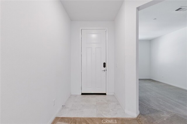 24583 Acadia Dr, Corona, CA 92883 - entryway with baseboards and carpet floors