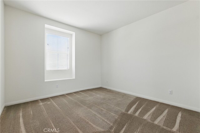 24583 Acadia Dr, Corona, CA 92883 - carpeted spare room featuring baseboards