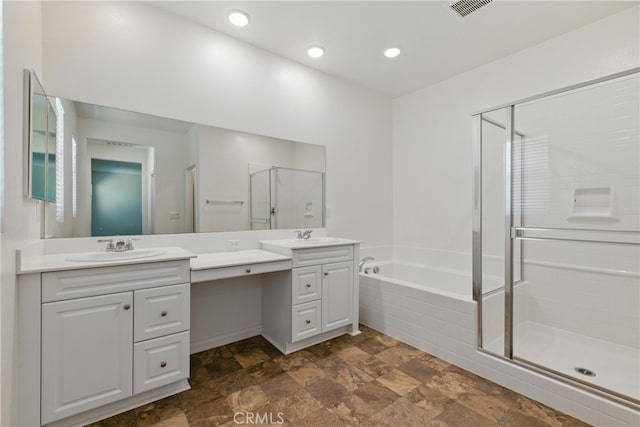 24583 Acadia Dr, Corona, CA 92883 - bathroom with double vanity, a bath, a stall shower, and stone finish flooring