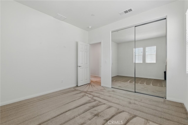 24583 Acadia Dr, Corona, CA 92883 - unfurnished bedroom with carpet floors and a closet