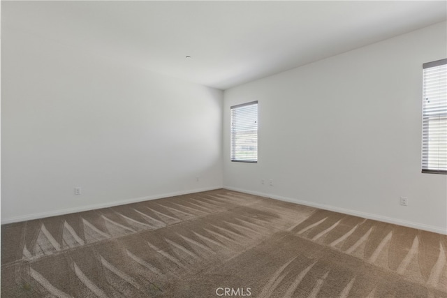 24583 Acadia Dr, Corona, CA 92883 - carpeted spare room featuring baseboards