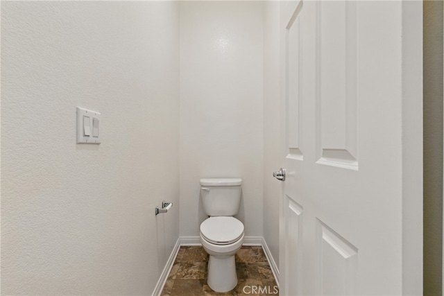 24583 Acadia Dr, Corona, CA 92883 - bathroom with baseboards and toilet