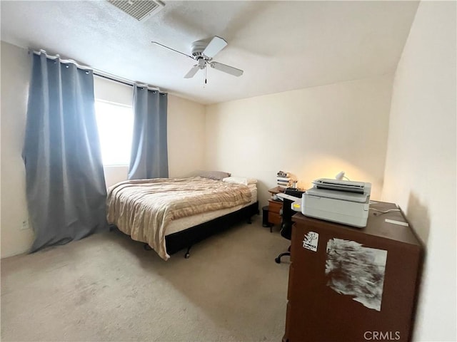 14376 Rivers Edge Rd, Helendale, CA 92342 - bedroom with carpet, a ceiling fan, and visible vents