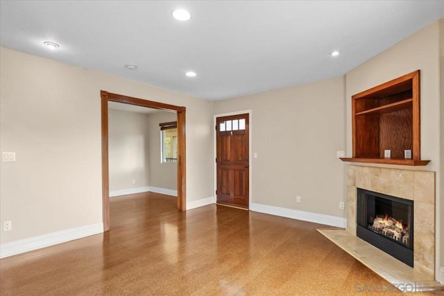 unfurnished living room with a premium fireplace