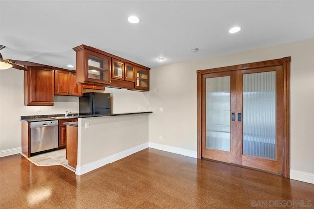 kitchen featuring ceiling fan, kitchen peninsula, black fridge, stainless steel dishwasher, and french doors